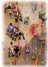 Handmade Toys and Dolls Hanging at a Store in Rajasthani Handicrafts Market